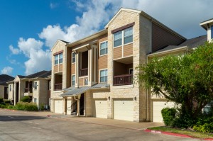 Apartments in Katy, TX - Exterior Apartment Building with Attached Garages (3)  